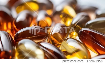 Assorted capsules in golden and amber hues Assorted capsules in golden and amber hues 122027958