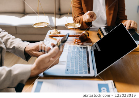 Lawyer or judge consult having team meeting at law office. Law and Legal services concept. Lawyer or judge consult having team meeting at law office. Law and Legal services concept. 122028019
