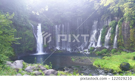 Mysterious Shiraito Falls with sunlight shining through 122029210