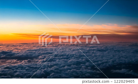 Sunset and sea of clouds seen from an airplane - Beautiful sky 122029405