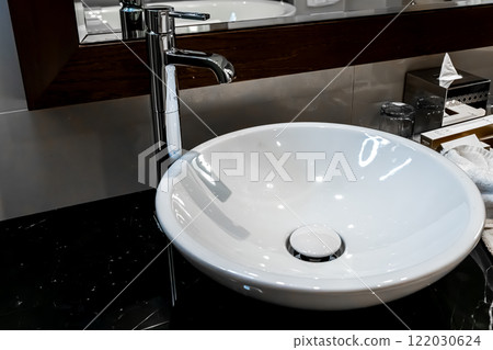 Modern square sink in the bathroom Modern square sink in the bathroom 122030624