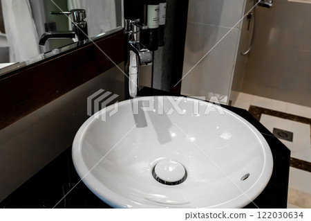 Modern square sink in the bathroom 122030634