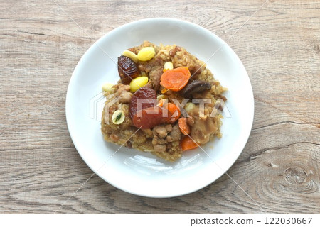 sticky rice steam with pork and salt egg couple wholegrain of Chinese Duanwu festival on plate 122030667