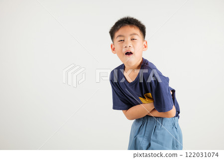 Portrait of Asian young kid boy has stomachache, primary child abdominal pain suffering from stomach ache, studio shot isolated on white background, food poisoning, Health and medical gastritis 122031074