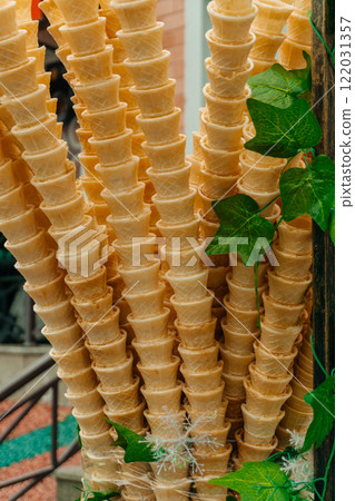 waffle cones for ice cream at the amusement park. empty ice cream cones in the store waffle cones for ice cream at the amusement park. empty ice cream cones in the store 122031357