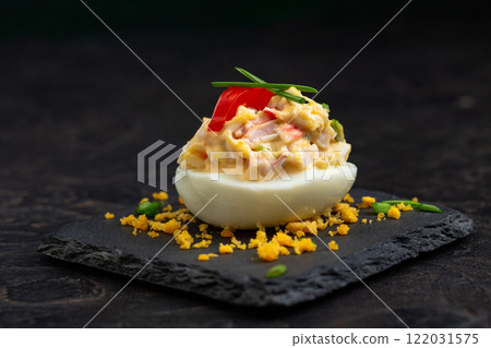 Deviled Egg with Paprika Garnish 122031575