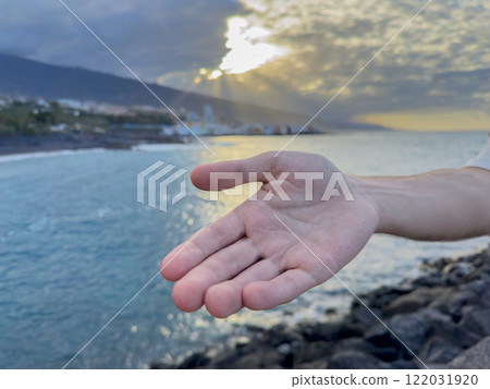 Jesus Christ giving his arm, hand gestures of Jesus dying on the cross and resurrected 122031920