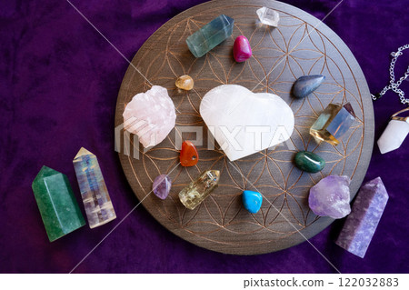Healing crystals on brown background Healing crystals on brown background 122032883