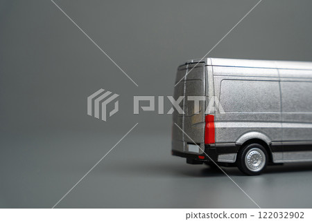 The back of a departing goods delivery and logistics van and copy space. Delivery and other services in the city. 122032902