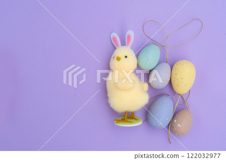 Easter colored eggs in nest 122032977