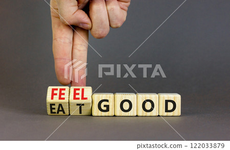 Eat and feel good symbol. Concept words Eat good Feel good on wooden cubes. Beautiful grey table grey background. Doctor hand. Healthy lifestyle eat and feel good concept. Copy space. Eat and feel good symbol. Concept words Eat good Feel good on wooden cubes. Beautiful grey table grey background. Doctor hand. Healthy lifestyle eat and feel good concept. Copy space. 122033879