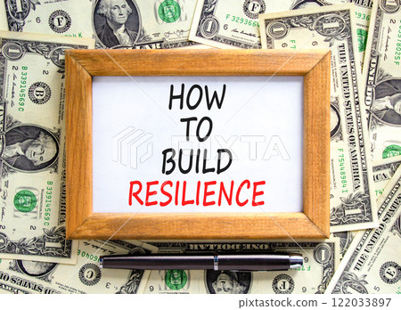 How to build resilience symbol. Concept words How to build resilience on beautiful wooden picture frame. Beautiful background from dollar bills. Business how to build resilience concept. Copy space. 122033897
