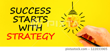 Success starts with strategy symbol. Concept words Success starts with strategy on beautiful yellow paper. Beautiful yellow background. Business and success starts with strategy concept. Copy space. Success starts with strategy symbol. Concept words Success starts with strategy on beautiful yellow paper. Beautiful yellow background. Business and success starts with strategy concept. Copy space. 122033905