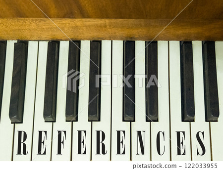 References or reference symbol. Concept word References on beautiful keys of the old retro piano. Beautiful piano-keys background. Business references or reference concept. Copy space. 122033955