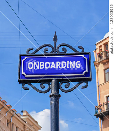 Onboarding success symbol. Concept word Onboarding on beautiful blue road sign. Beautiful blue sky and city building background. Business onboarding success concept. Copy space. Onboarding success symbol. Concept word Onboarding on beautiful blue road sign. Beautiful blue sky and city building background. Business onboarding success concept. Copy space. 122033956