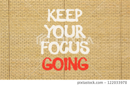 Keep your focus going symbol. Concept words Keep your focus going on beautiful brick wall. Beautiful brick wall background. Business and keep your focus going concept. Copy space 122033978