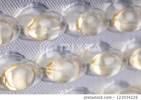 Macro view of gel capsules in blister pack 122034228