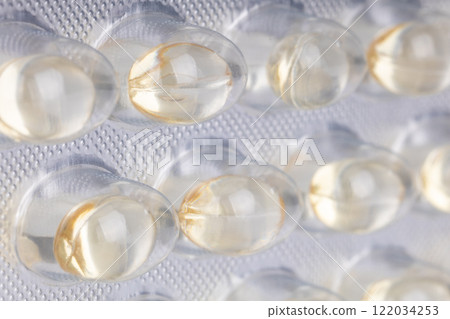Angled macro view of gel capsules in blister pack Angled macro view of gel capsules in blister pack 122034253