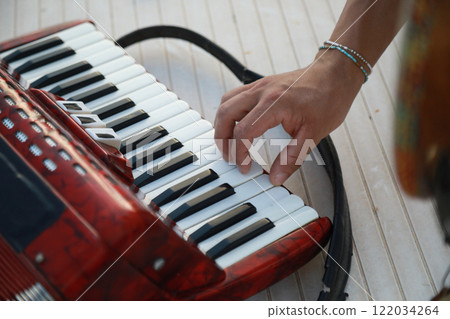 Musician's Fingers Dancing Over Accordion Keys Musician's Fingers Dancing Over Accordion Keys 122034264