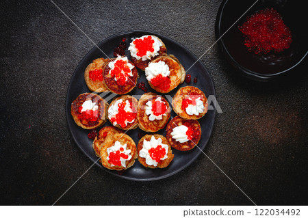 Demidoff pancakes, mini pancakes, with sour cream and red caviar, crepes. homemade, no people, 122034492