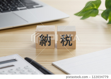 Building blocks with the word "tax payment" written on them Building blocks with the word "tax payment" written on them 122034779