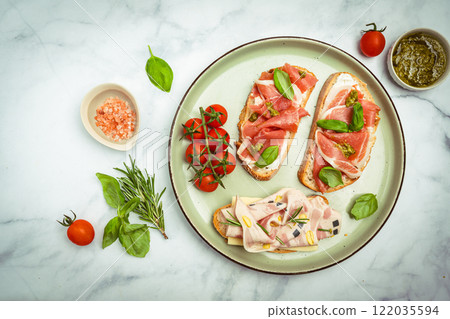 Assorted delicious baguette sandwiches Assorted delicious baguette sandwiches 122035594