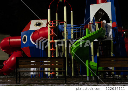 Playground at night in the park under a street lamp 122036111