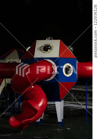 Playground at night in the park under a street lamp Playground at night in the park under a street lamp 122036126