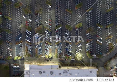 Top view of many cars parked on a parking lot in front of a shopping mall in Florida. Concept of urban transportation 122036483