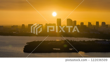 View from above of contemporary high skyscraper buildings in downtown district of Tampa city in Florida, USA at sunset. American megapolis with business financial district View from above of contemporary high skyscraper buildings in downtown district of Tampa city in Florida, USA at sunset. American megapolis with business financial district 122036509