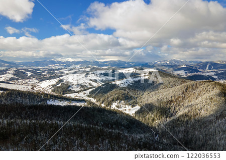 Winter landscape with spruse trees of snow covered forest in cold mountains. Winter landscape with spruse trees of snow covered forest in cold mountains. 122036553