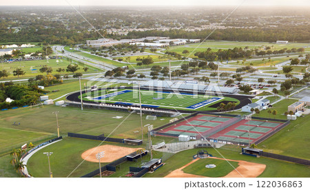 Public high school sports facilities in Florida. American football stadium, tennis courts and baseball diamond sport infrastructure Public high school sports facilities in Florida. American football stadium, tennis courts and baseball diamond sport infrastructure 122036863