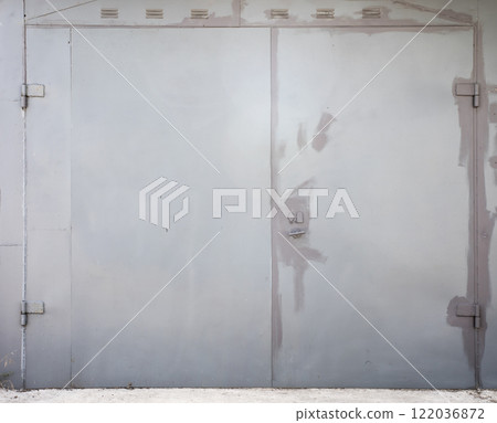 old metal door to the car garage 122036872