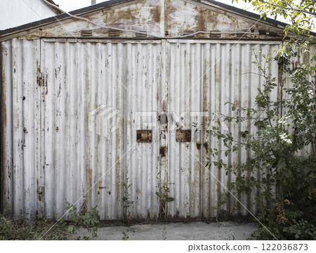 old metal door to the car garage 122036873