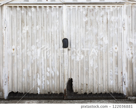 old metal door to the car garage 122036881