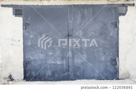 old metal door to the car garage 122036891