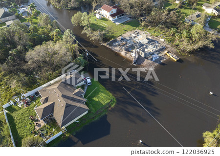 Flooded houses by hurricane rainfall in Florida residential area. Consequences of natural disaster Flooded houses by hurricane rainfall in Florida residential area. Consequences of natural disaster 122036925
