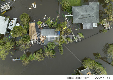 Heavy flood with high water surrounding residential houses after hurricane Ian rainfall in Florida residential area. Consequences of natural disaster 122036954