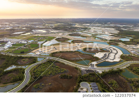 Development of residential housing in American suburbs. Beginning of construction works on prepared ground 122037074