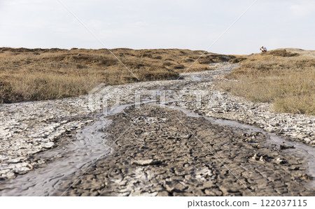 photo of a mud volcano eruption, landscape photography photo of a mud volcano eruption, landscape photography 122037115