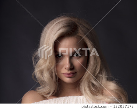 young beautiful woman on a dark background, full length studio shot young beautiful woman on a dark background, full length studio shot 122037172