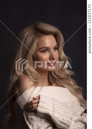 young beautiful woman on a dark background, full length studio shot young beautiful woman on a dark background, full length studio shot 122037173