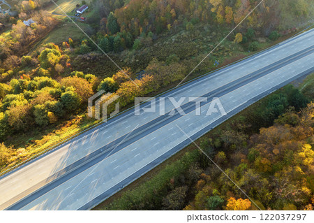 American highway with fast moving traffic. Interstate transportation concept American highway with fast moving traffic. Interstate transportation concept 122037297
