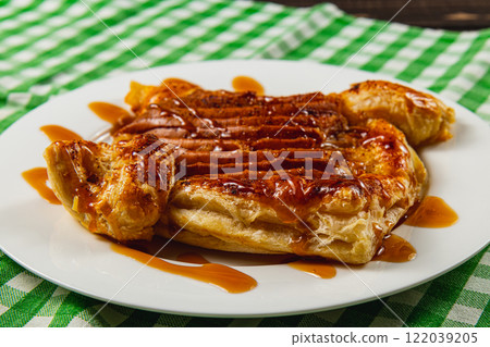 Beautiful night sky with moon partially hidden by clouds over Lviv Ukraine 122039205