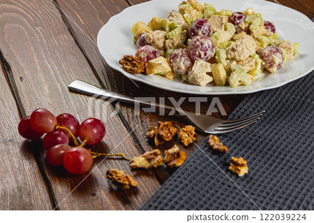 Peach harvesting in a dense Croatian orchard during summer 122039224