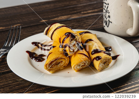 Moonlit night over the clouds in Lviv, Ukraine with an incomplete moon 122039239