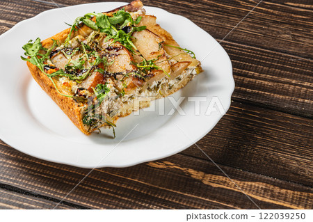 Easter cake made with lean buns and fresh ingredients, baked in a frying pan Easter cake made with lean buns and fresh ingredients, baked in a frying pan 122039250