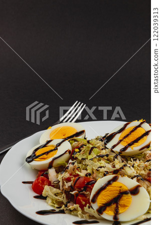 Nighttime view of the moon hidden in clouds over Lviv, Ukraine Nighttime view of the moon hidden in clouds over Lviv, Ukraine 122039313