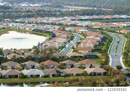 Rich neighborhood with expensive residential homes in southwest Florida. Wealthy suburban area 122039381