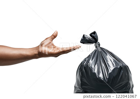 a man's hand holds out a rubbish bag on the white background a man's hand holds out a rubbish bag on the white background 122041067